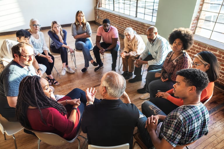 Diverse group in discussion circle