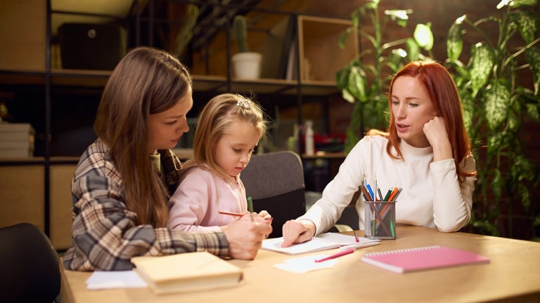 Family helping child with homework